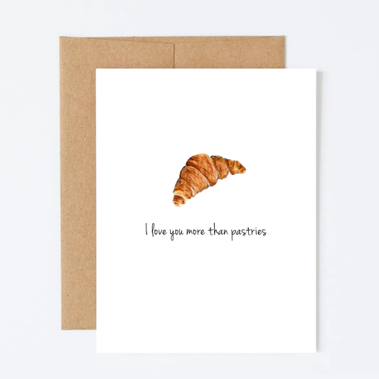 Card with a croissant illustration and text 'I love you more than pastries' on a white background.
