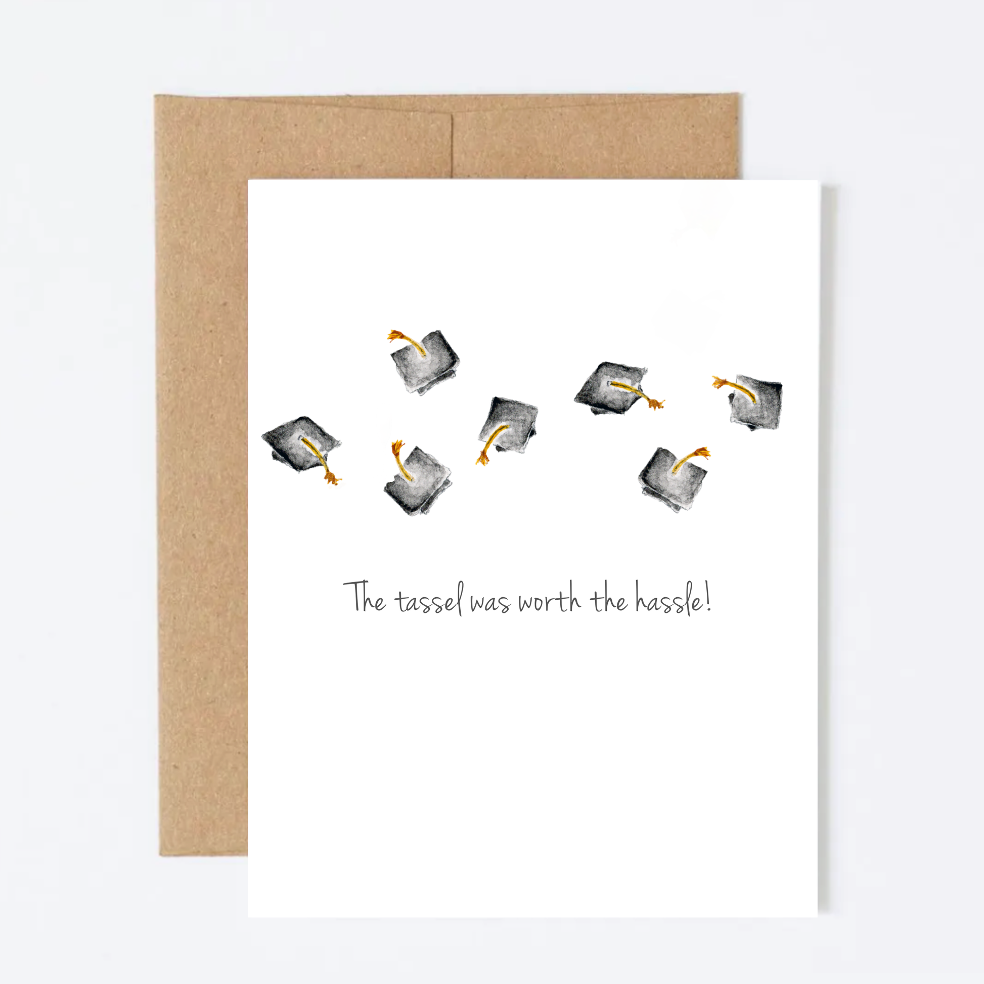 Graduation-themed greeting card with tassels and 'The tassel was worth the hassle!' text, on a white background.
